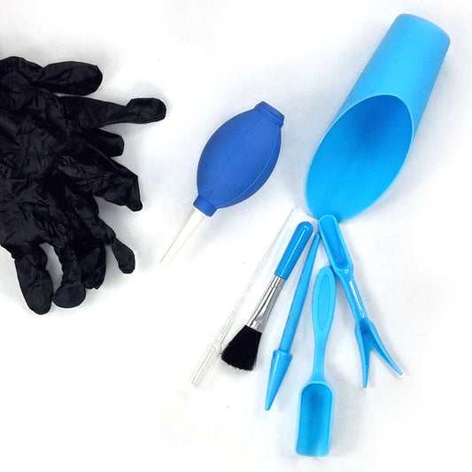 7 piece planting tool kit including a pipette, a brush, a widger and dibber, a scoop, a soil scoop, and a cleaning pump all in the colour blue with a pair of black nitrile powder free gloves